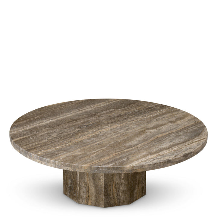 Round stone table with a textured surface on a white background