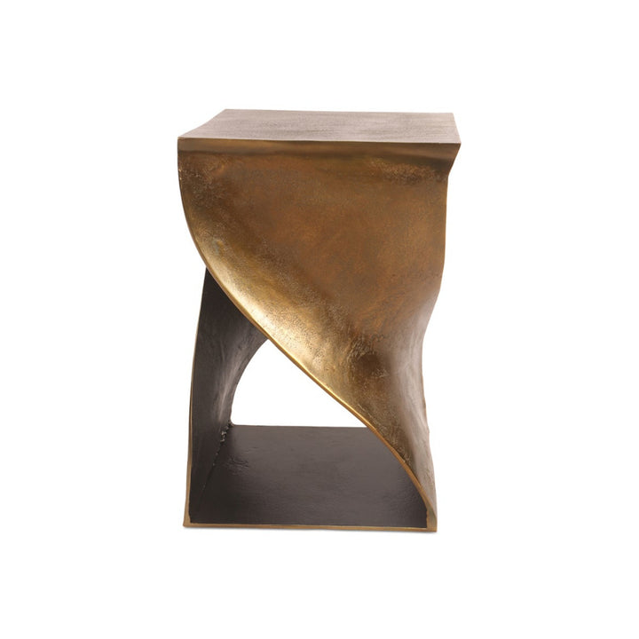 Brass accent table on a white background