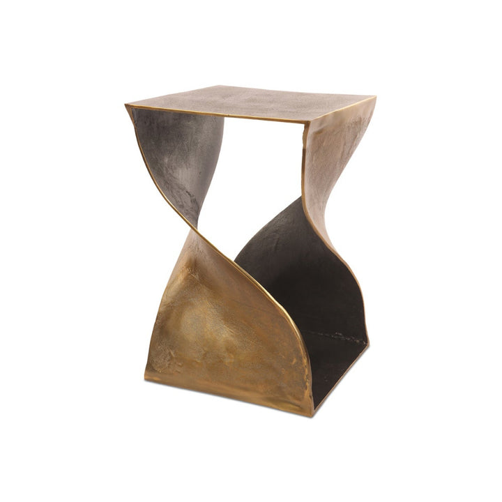 Brass accent table with a unique, curved design on a white background