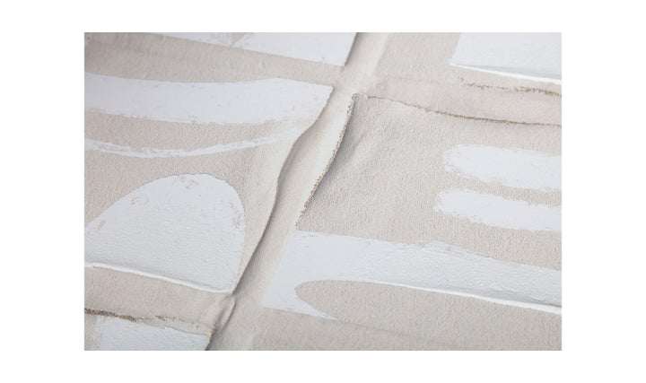 Close-up of beige fabric with white abstract patterns on a white background