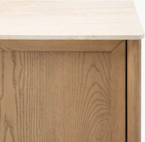 Three-quarter view of the Anneka Cabinet with marble top