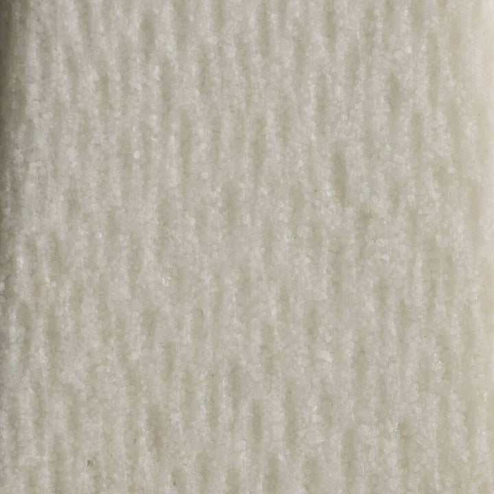 Close-up of a textured white sculpture's surface