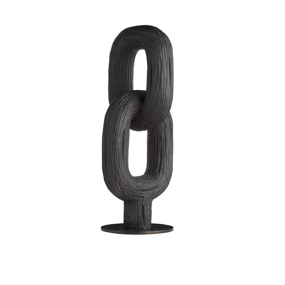 Black sculpture on a white background