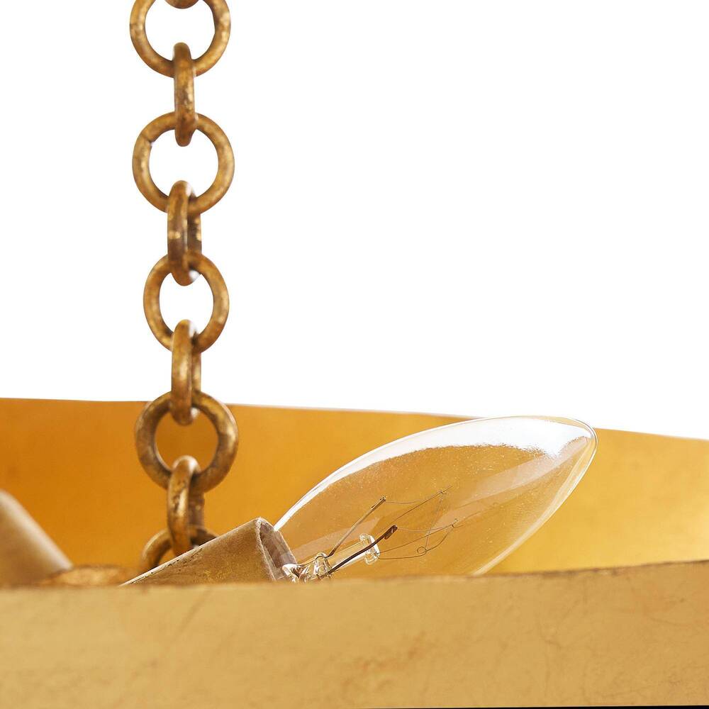 Close-up of a light bulb with a chain on a white background