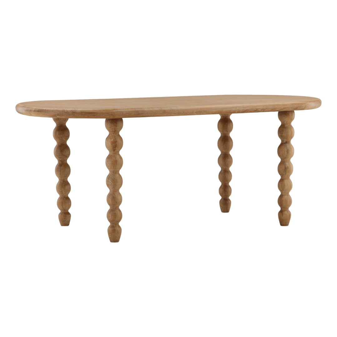 Bexwell Dining Table in light natural mango wood, three-quarter view