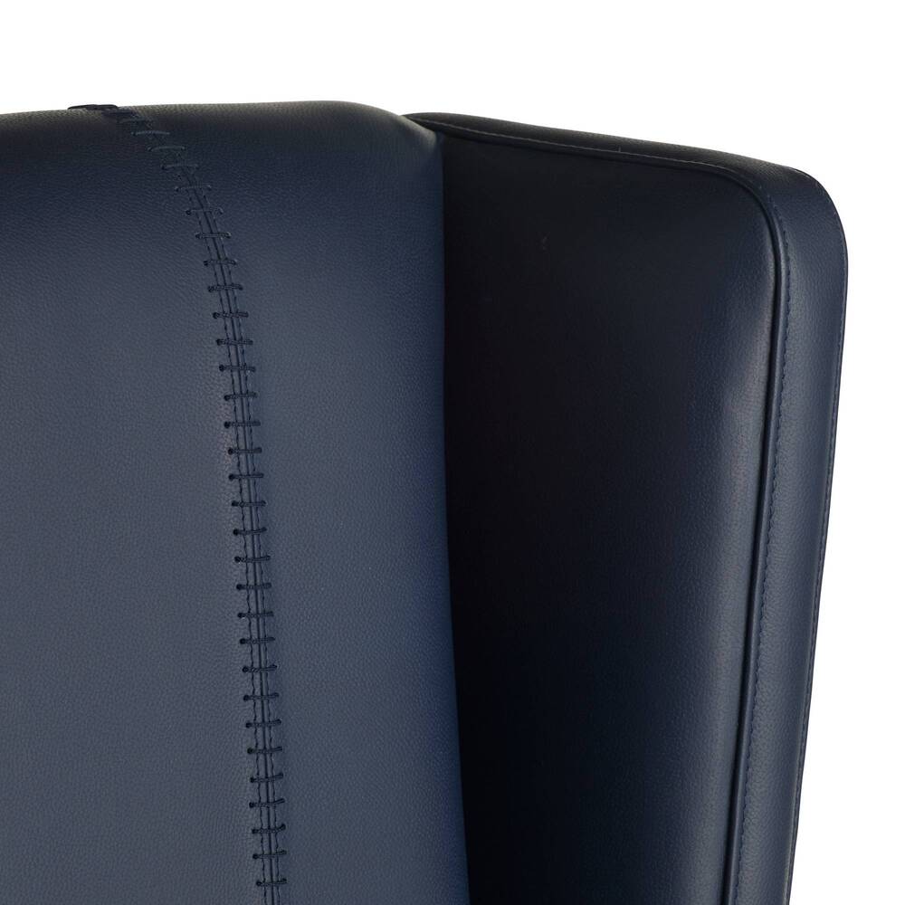 Close-up of a navy blue leather chair with visible stitching on a white background