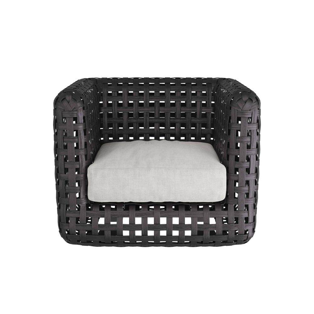 Woven chair with a white cushion on a white background