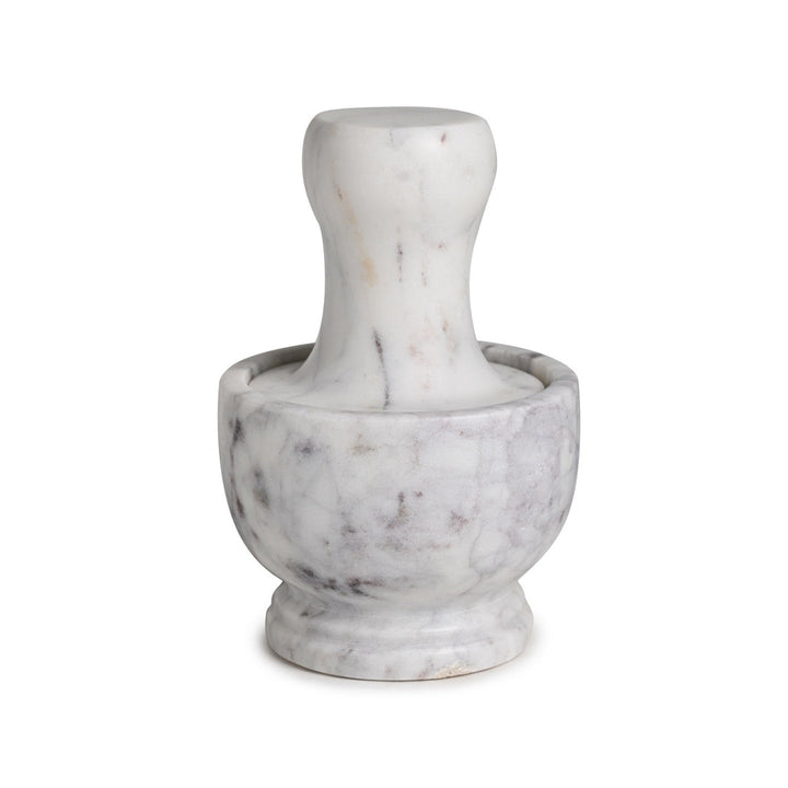 Marble mortar and pestle on a white background