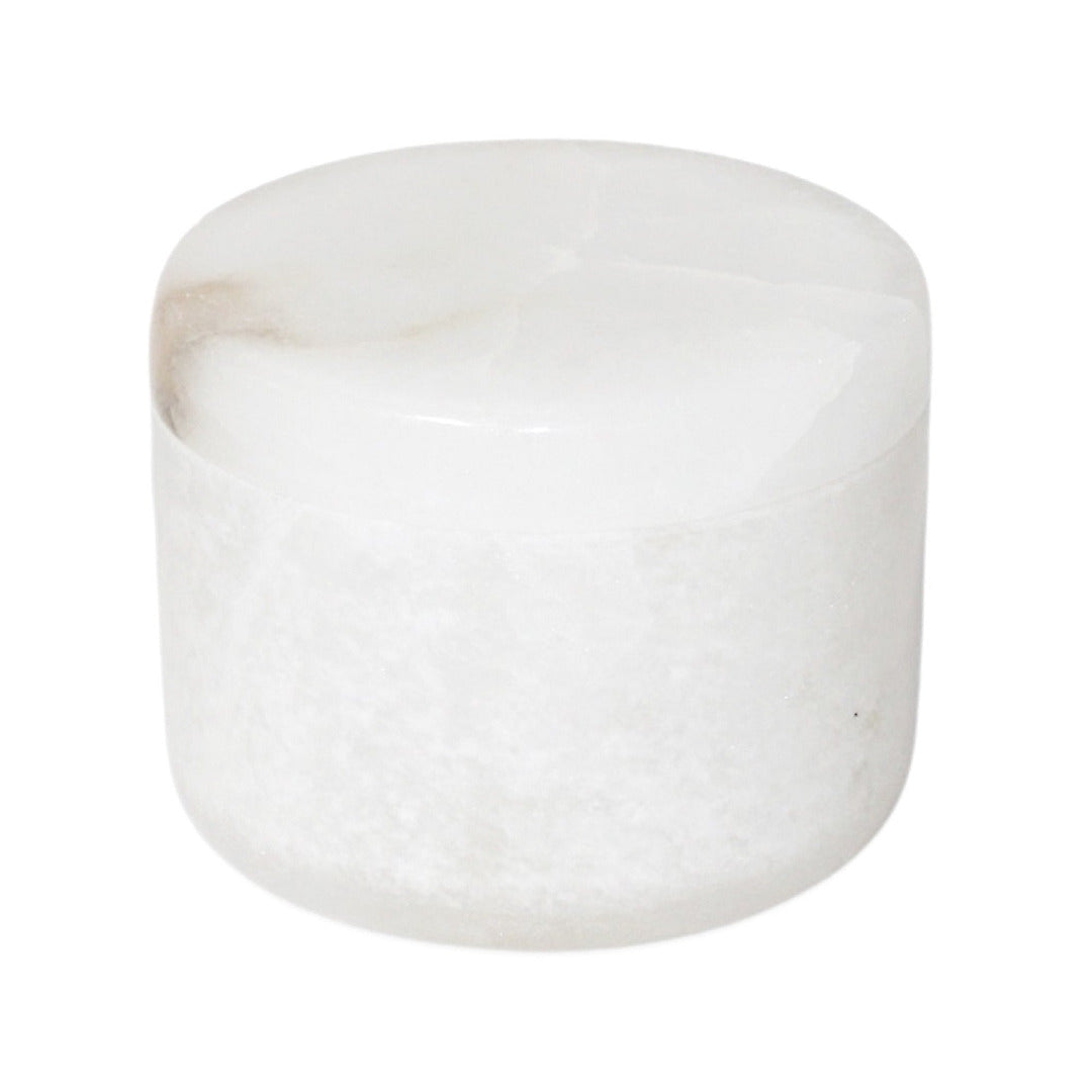 White alabaster cylindrical box on a white background