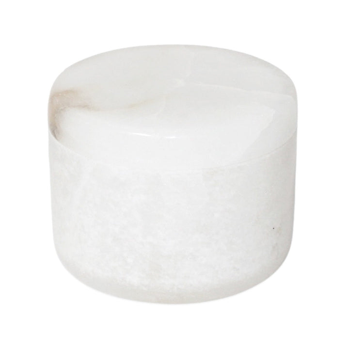 White alabaster cylindrical box on a white background